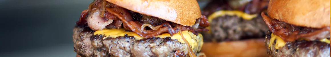 Eating Burger at Burger Factory restaurant in Hollister, CA.